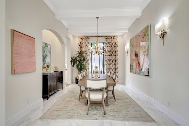 dining room with marble finish floor, ornamental molding, and baseboards