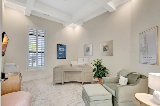 interior space with coffered ceiling, beam ceiling, and baseboards