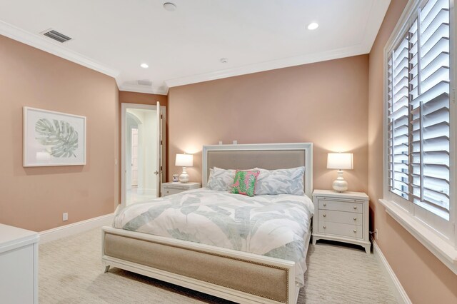 bedroom featuring carpet, visible vents, crown molding, and baseboards