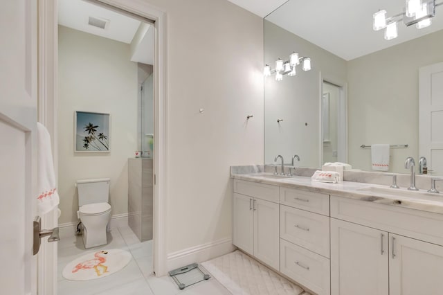 bathroom with toilet, tile patterned flooring, a sink, and visible vents