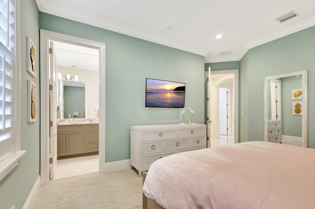 bedroom featuring light colored carpet, visible vents, ornamental molding, connected bathroom, and baseboards