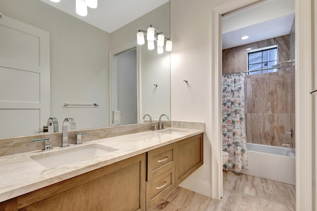 full bath featuring toilet, shower / bathtub combination with curtain, double vanity, and a sink