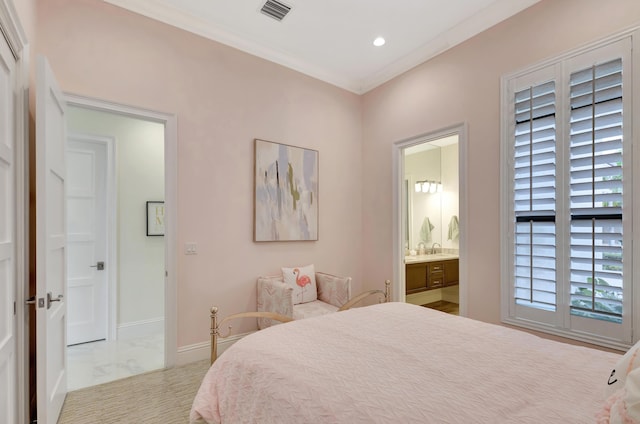 bedroom with recessed lighting, visible vents, baseboards, ensuite bath, and crown molding