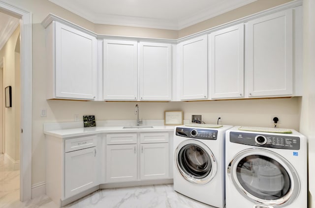 washroom with marble finish floor, crown molding, cabinet space, a sink, and independent washer and dryer