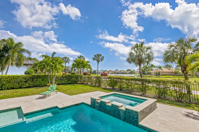 view of pool featuring a lawn, a patio area, fence, and a pool with connected hot tub