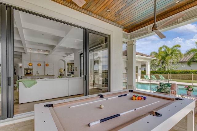 playroom with ceiling fan, wooden ceiling, coffered ceiling, billiards, and beamed ceiling