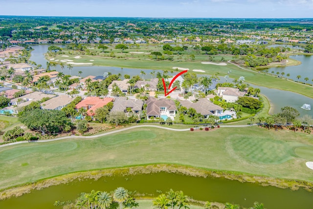 bird's eye view with a residential view, a water view, and golf course view