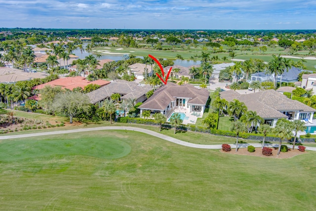 birds eye view of property featuring a water view, a residential view, and golf course view