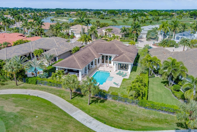 bird's eye view with a residential view and a water view