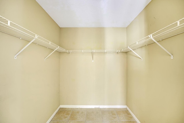 walk in closet featuring tile patterned floors