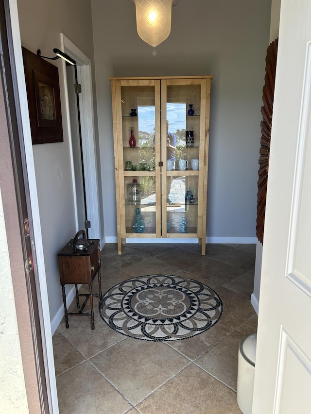 exterior space featuring stucco siding and french doors