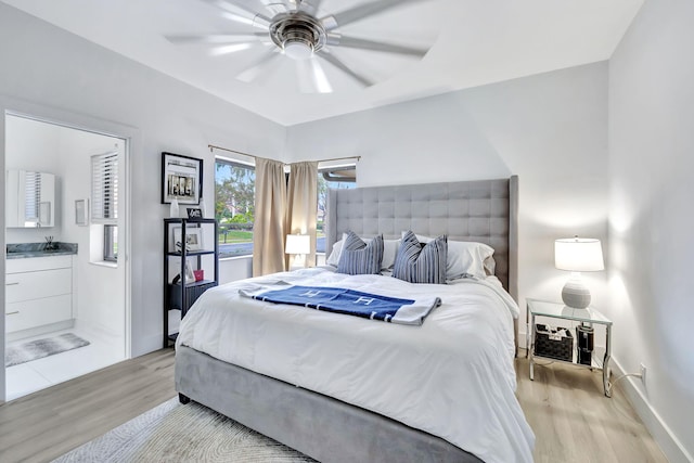 bedroom with baseboards, a ceiling fan, and light wood-style floors