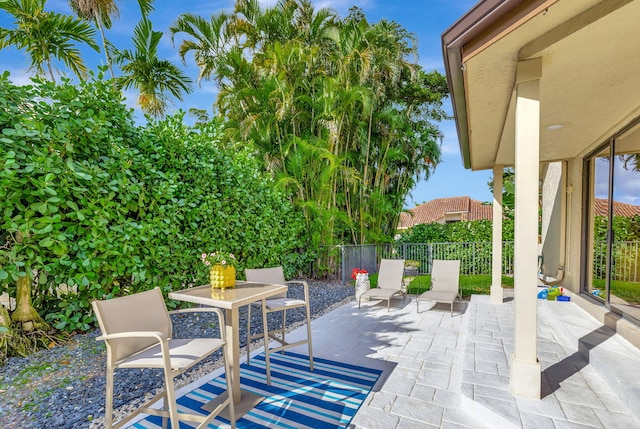 view of patio with fence