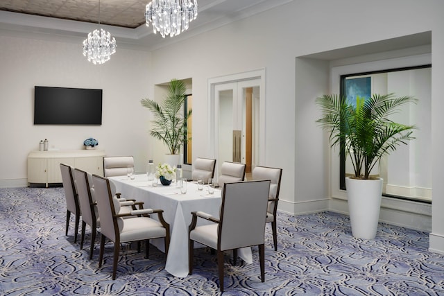 dining room featuring a chandelier, a tray ceiling, crown molding, and baseboards