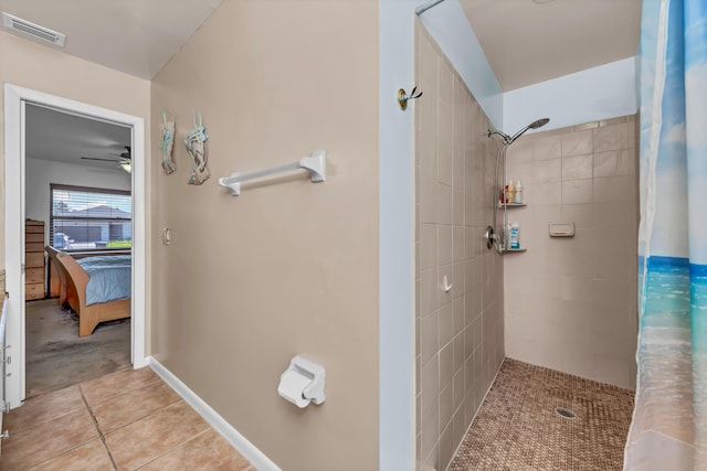 full bathroom featuring ensuite bathroom, tile patterned flooring, a tile shower, and visible vents