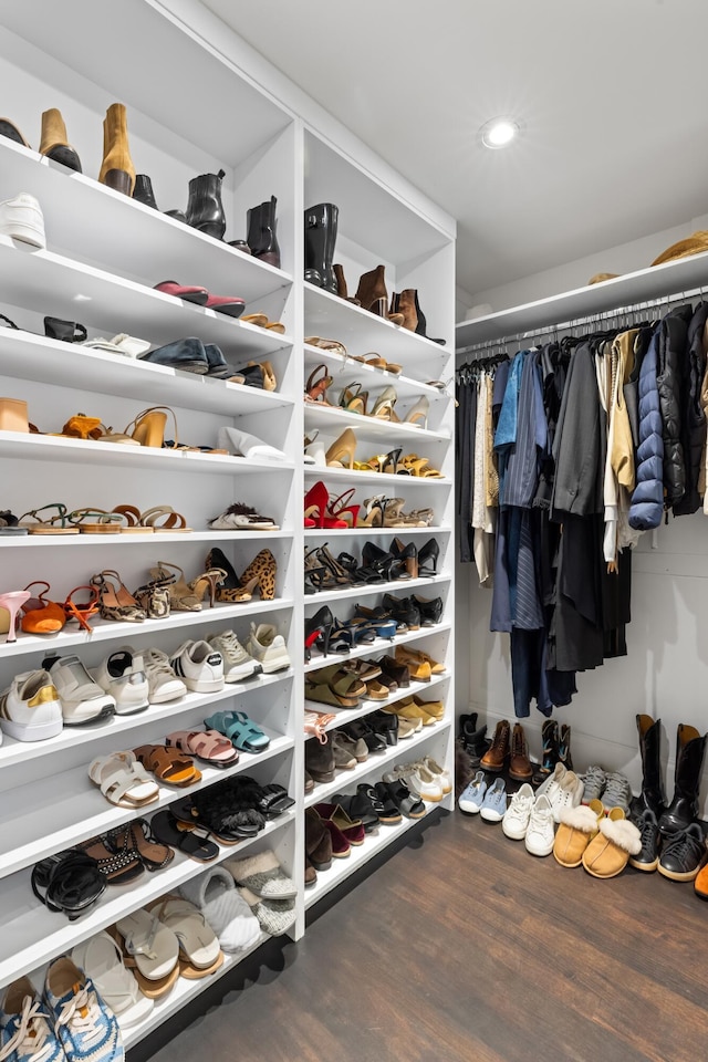 spacious closet with wood finished floors