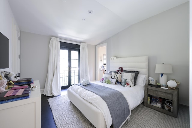 bedroom with vaulted ceiling