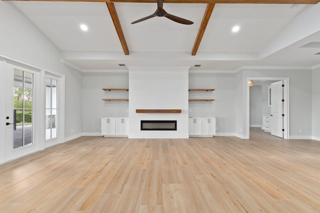 unfurnished living room featuring a large fireplace, baseboards, beam ceiling, light wood finished floors, and crown molding