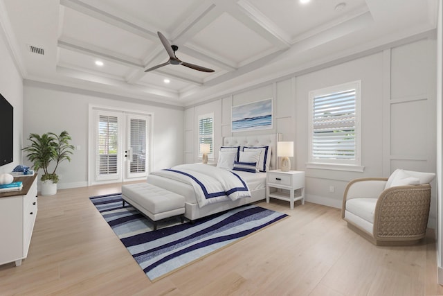 bedroom featuring access to outside, multiple windows, visible vents, and coffered ceiling