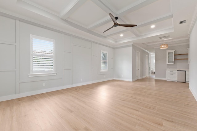 unfurnished living room with light wood finished floors, visible vents, coffered ceiling, and beamed ceiling