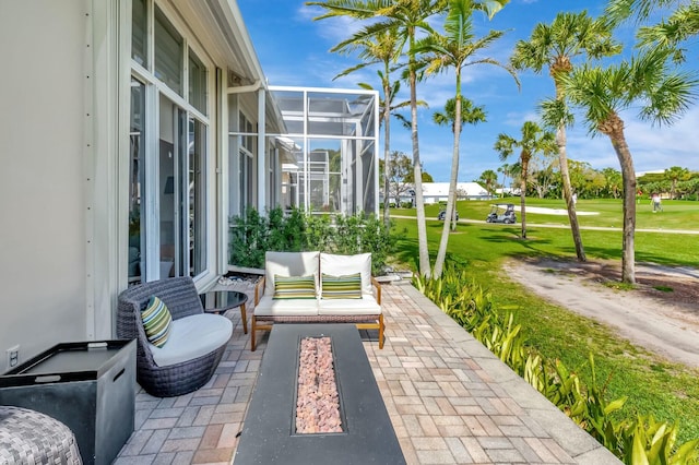 view of patio / terrace with glass enclosure