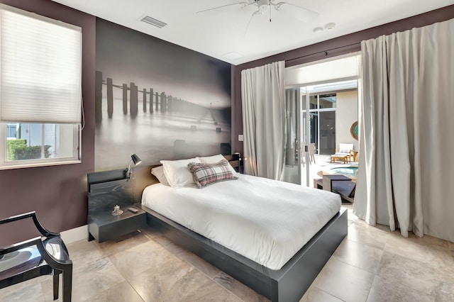 bedroom featuring access to outside, visible vents, ceiling fan, and baseboards