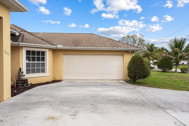 garage featuring driveway