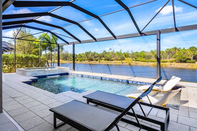 view of swimming pool with a patio, a water view, and a lanai