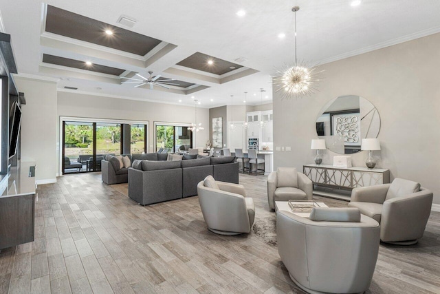 living area featuring ornamental molding, coffered ceiling, a high ceiling, and light wood-style floors