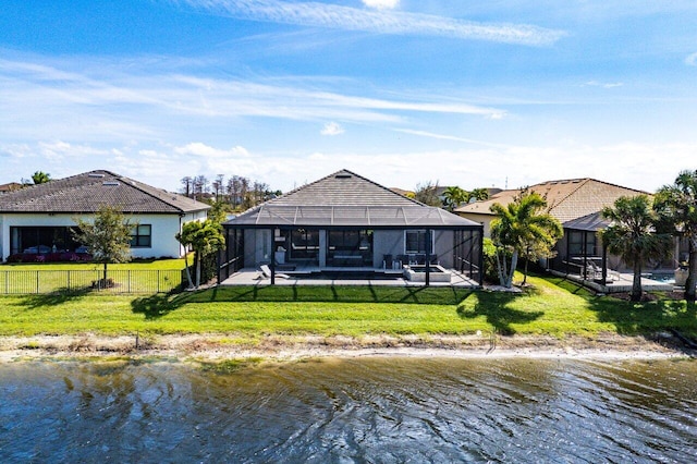 back of house with a fenced in pool, a yard, a water view, glass enclosure, and fence