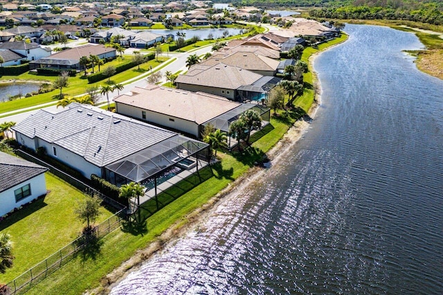 aerial view featuring a water view and a residential view