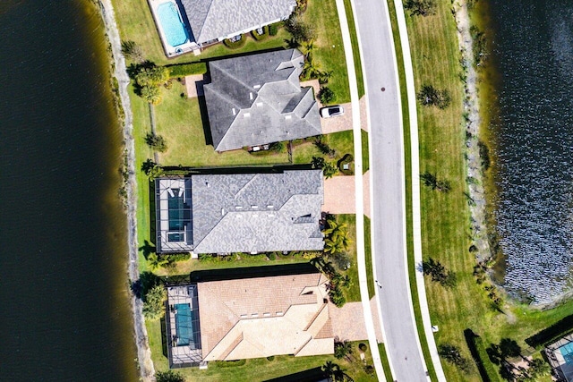 drone / aerial view featuring a water view