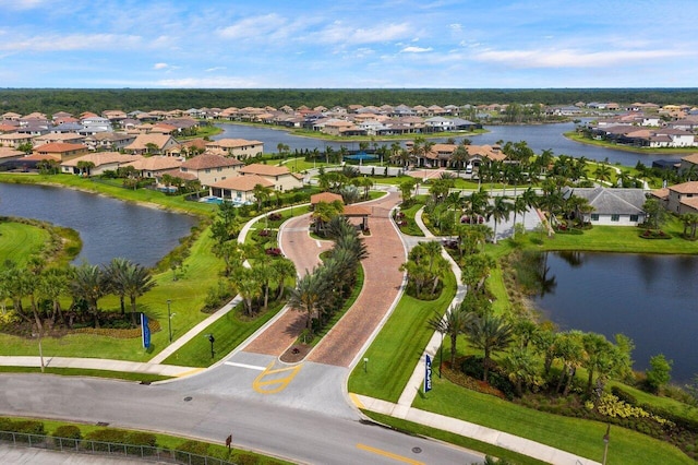 aerial view with a water view and a residential view