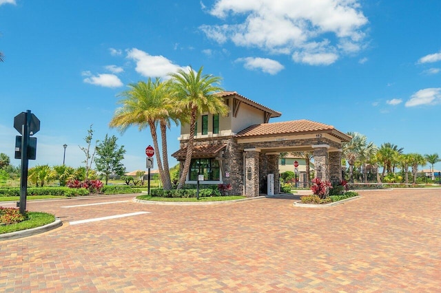 view of property's community featuring a gate