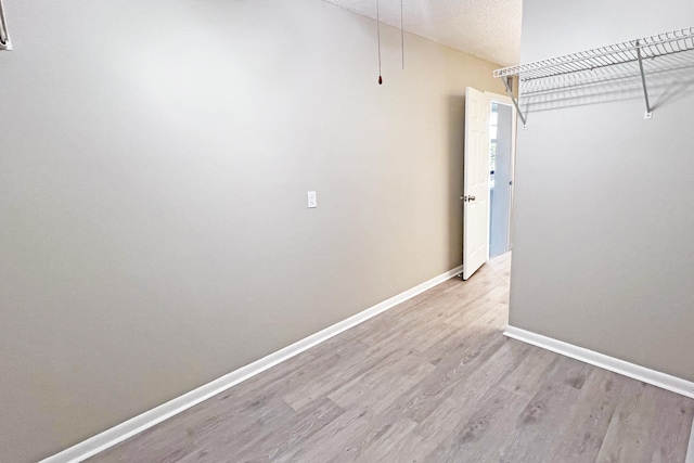 3636 Whitehall Dr Unit 402A, West Palm Beach, FL 33401 - walk in closet featuring wood finished floors