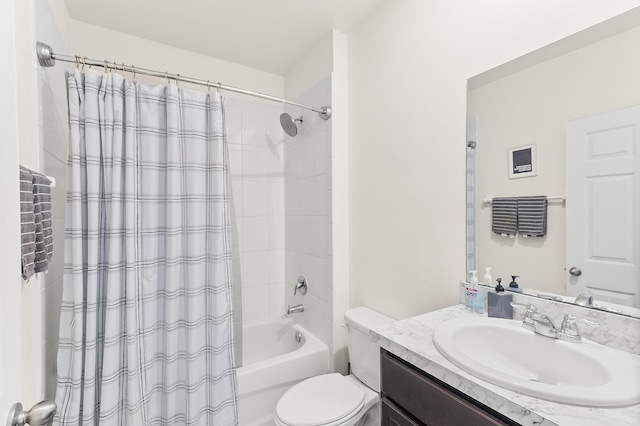 full bath featuring vanity, toilet, and shower / tub combo with curtain