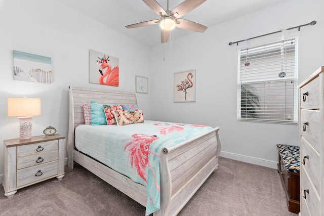 carpeted bedroom with baseboards and a ceiling fan