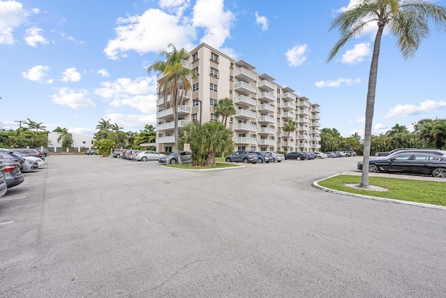 view of property with uncovered parking