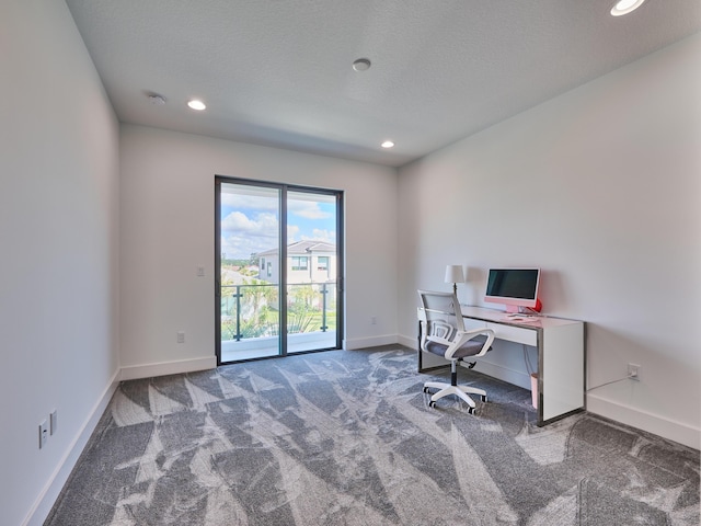 carpeted home office featuring baseboards, a textured ceiling, and recessed lighting