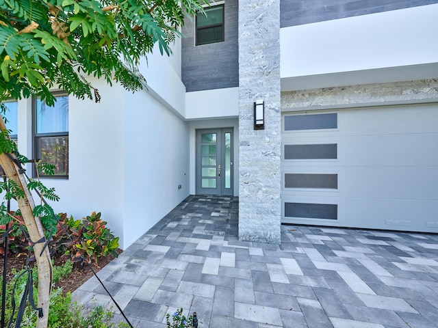 property entrance featuring french doors