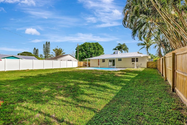 view of yard featuring a fenced backyard and a patio area