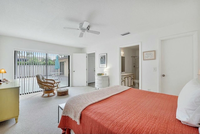8202 Ambach Way, Hypoluxo, FL 33462 - carpeted bedroom featuring access to exterior, ensuite bath, and ceiling fan