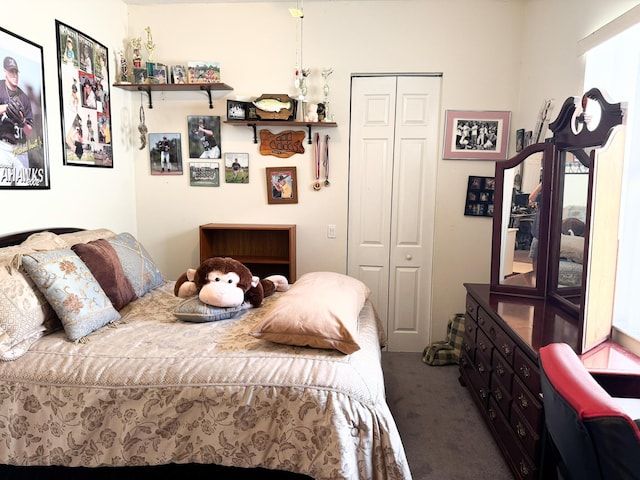 carpeted bedroom with a closet