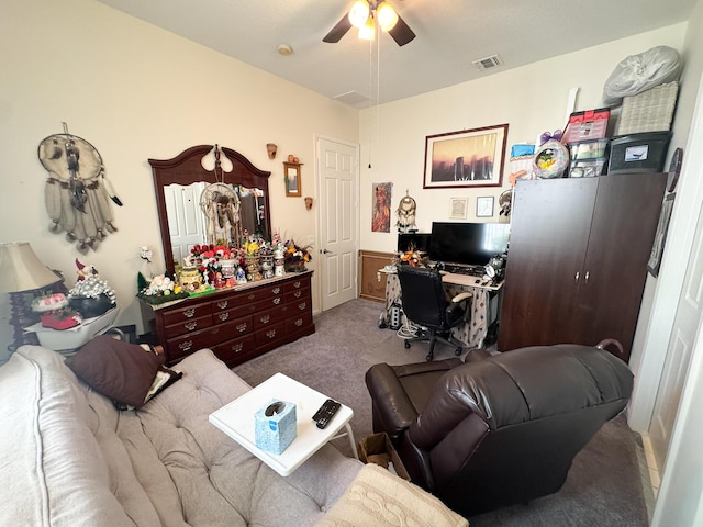 home office featuring visible vents, carpet flooring, and ceiling fan