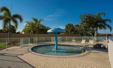 view of pool with fence