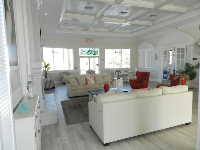 living room with light wood-style flooring, beamed ceiling, coffered ceiling, and ornamental molding