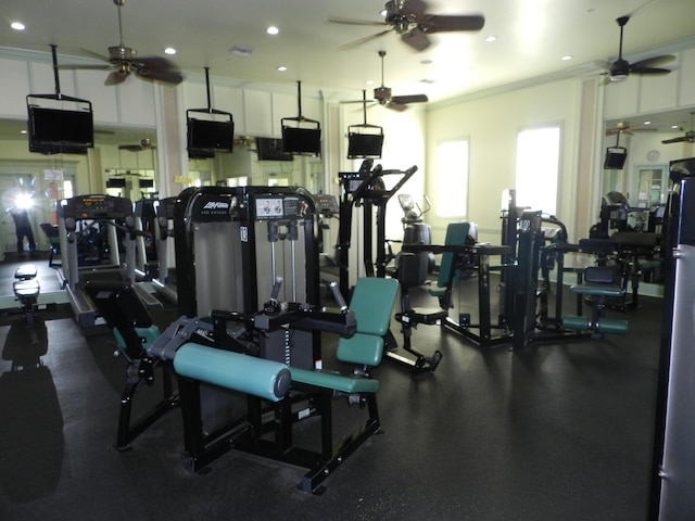 workout area featuring recessed lighting, crown molding, and a ceiling fan