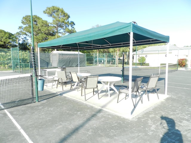 view of patio featuring fence