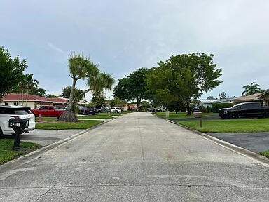 view of street featuring curbs