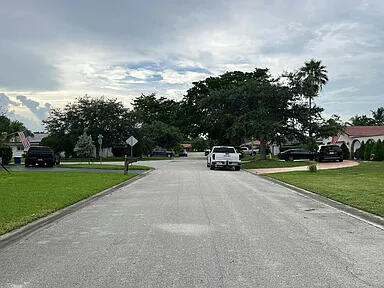 view of road featuring curbs